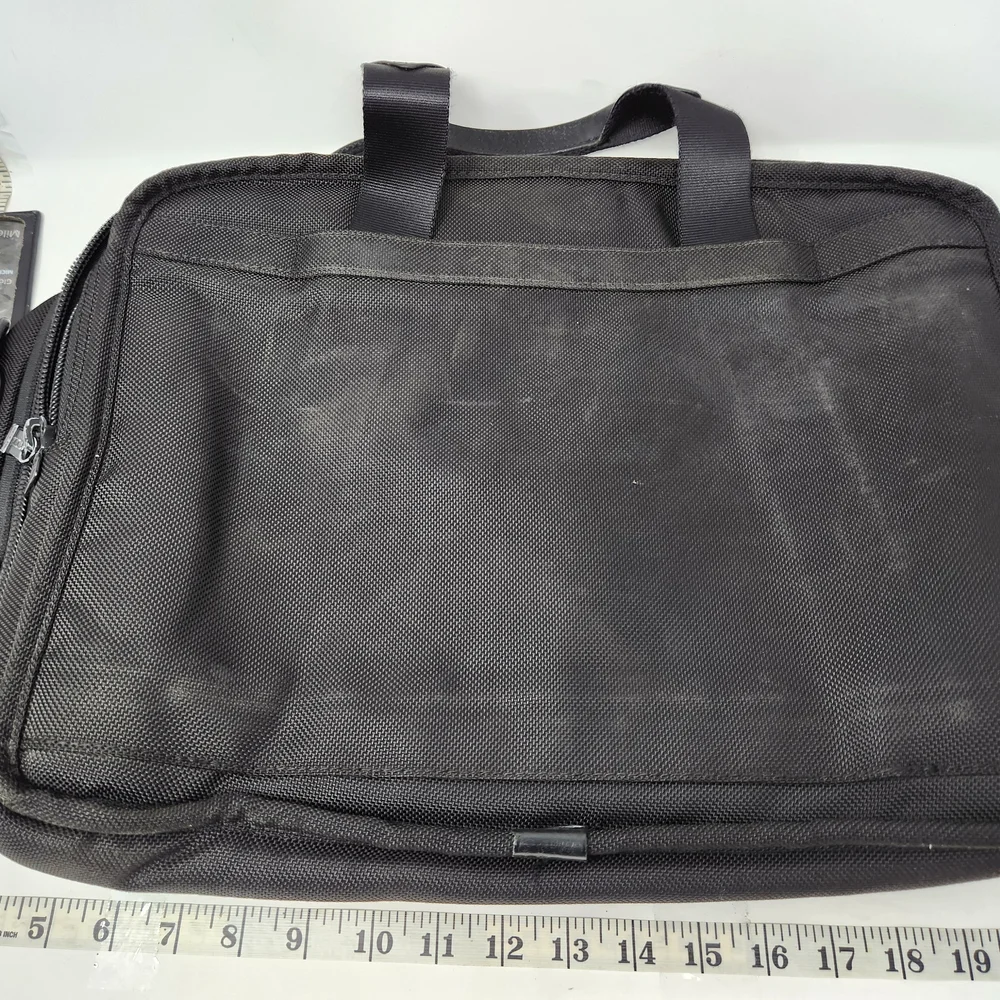 TUMI Black Briefcase with Durable Design